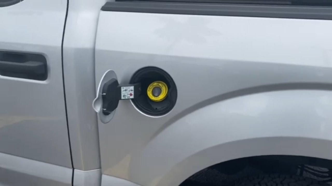 how to open the gas cap on a ford f150